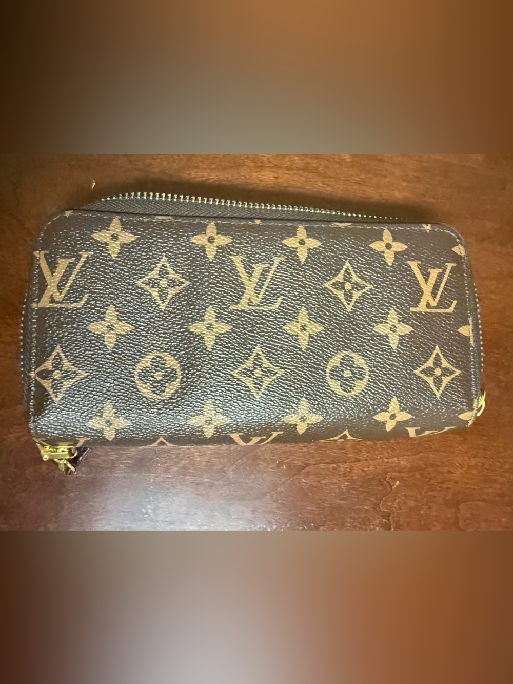 Luxury brand Monogram Canvas Zip Wallet in Brown and Gold with wrist strap